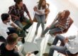 a group of people participate in group counseling for addiction recovery