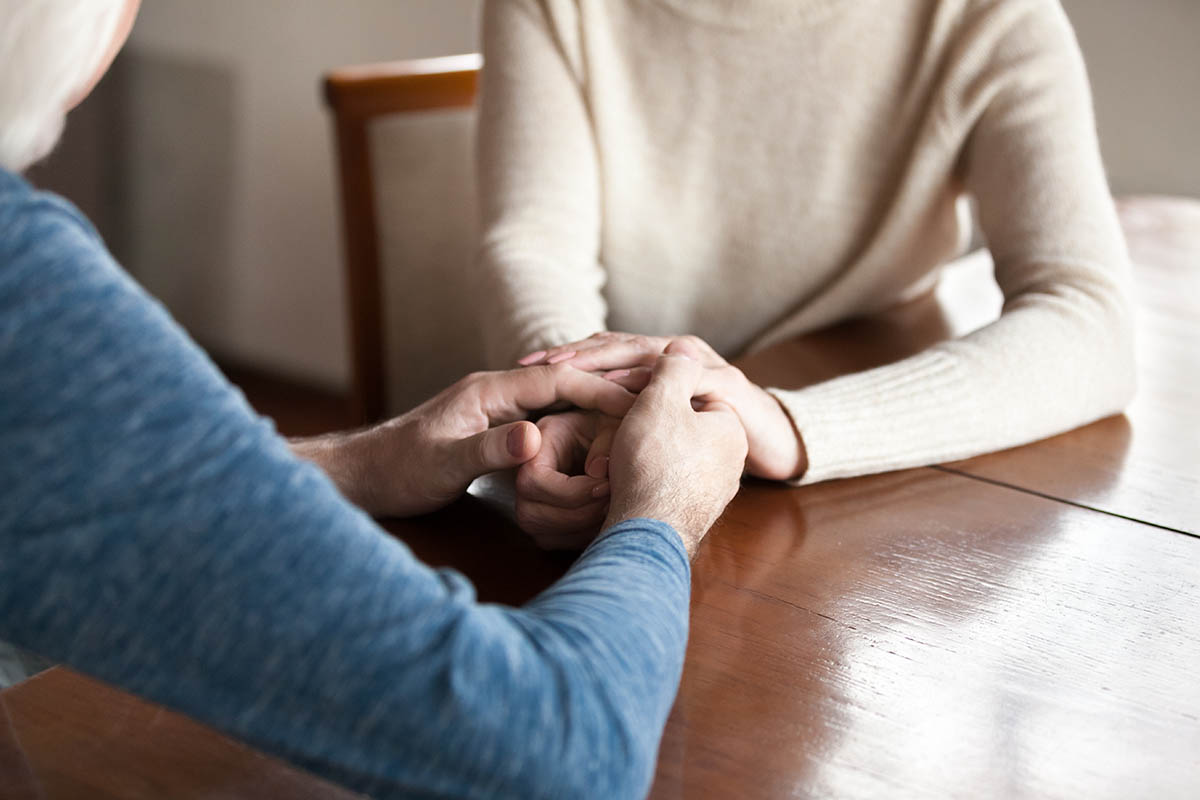 two people discuss the importance of forgiveness in recovery